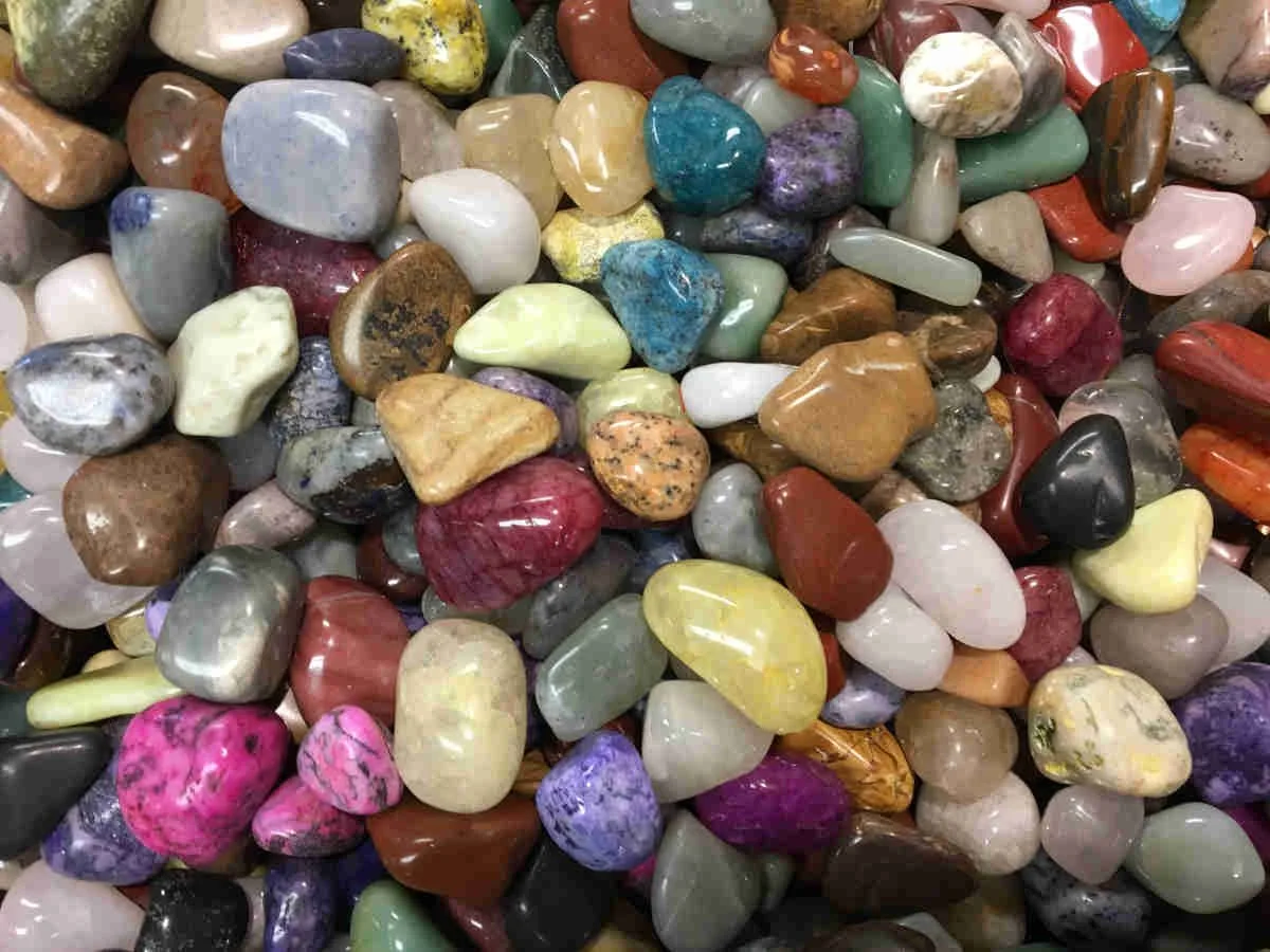 Assorted colorful tumbled and polished stones