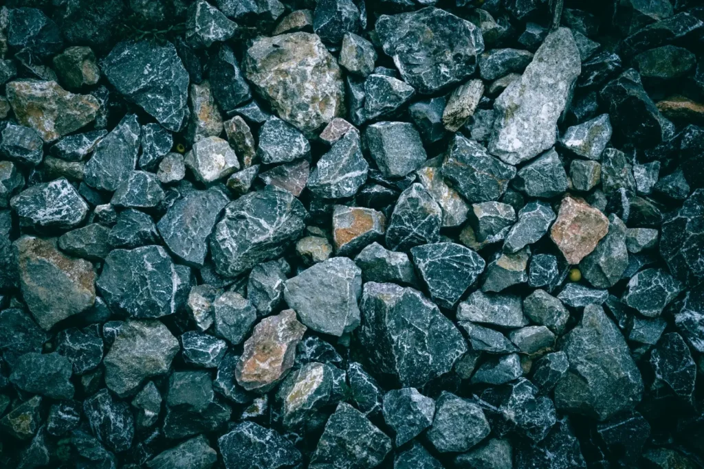 Rough, angular rock pieces ready for the coarse grind in a rotary tumbler